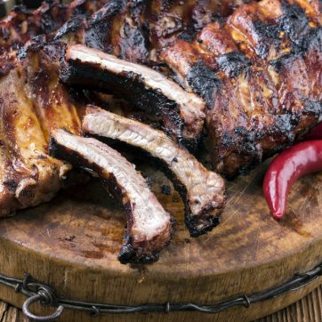 outdoor reared pork rack of ribs chargrilled
